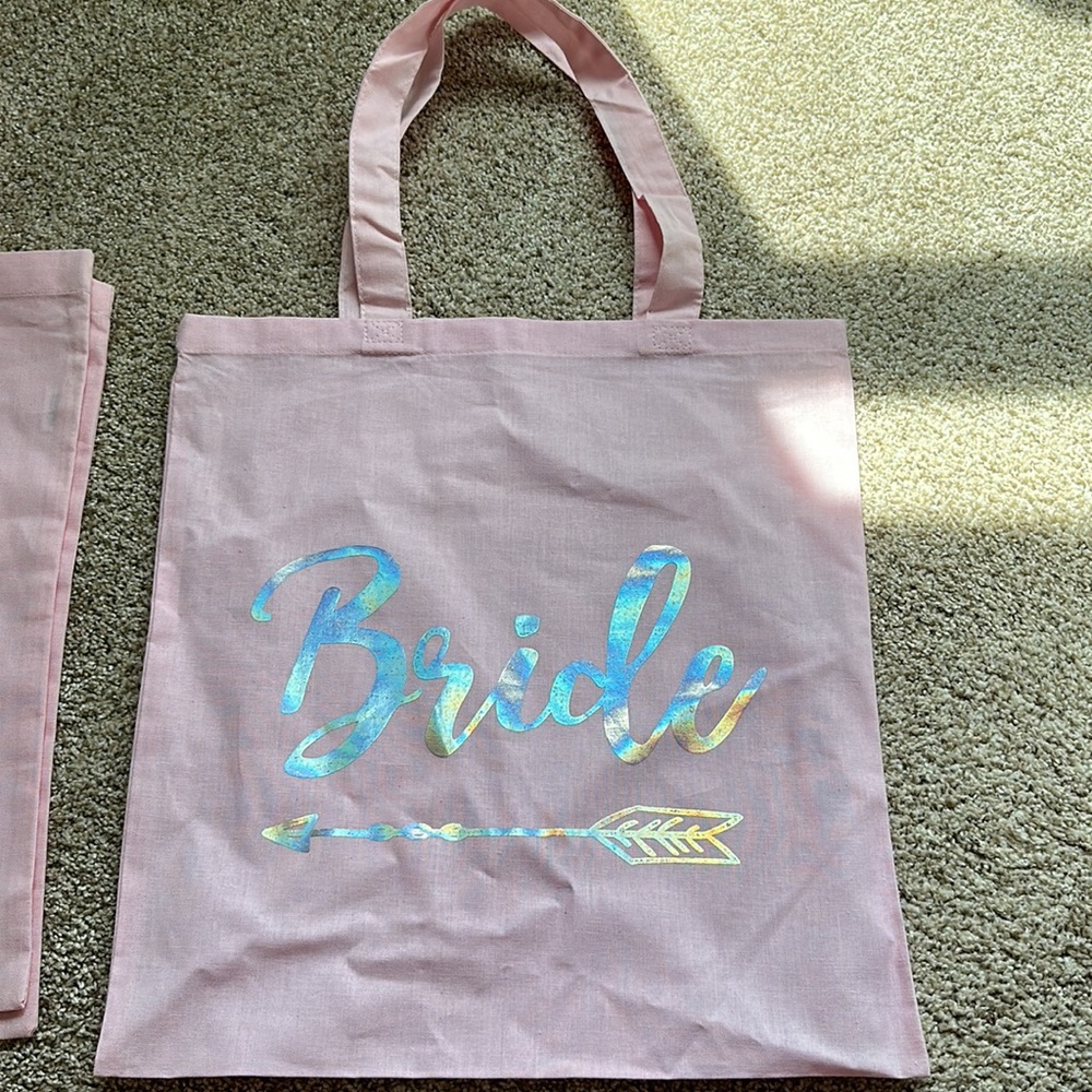 15 bachelorette/bridesmaid totes. 1 Bride and 14 bride tribe pink totes. NWOT